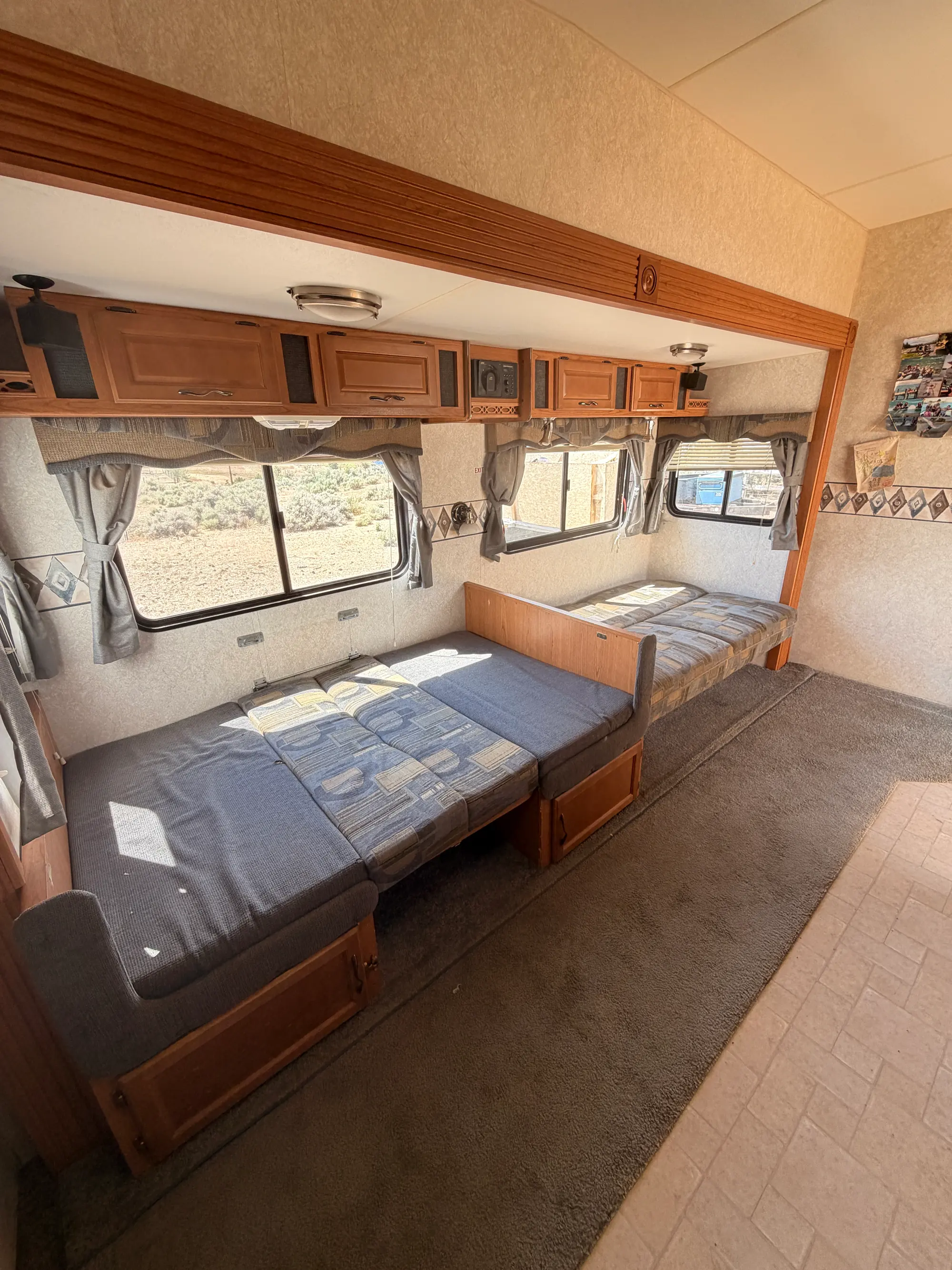 Wide view of the living area showing both fold-out sofas